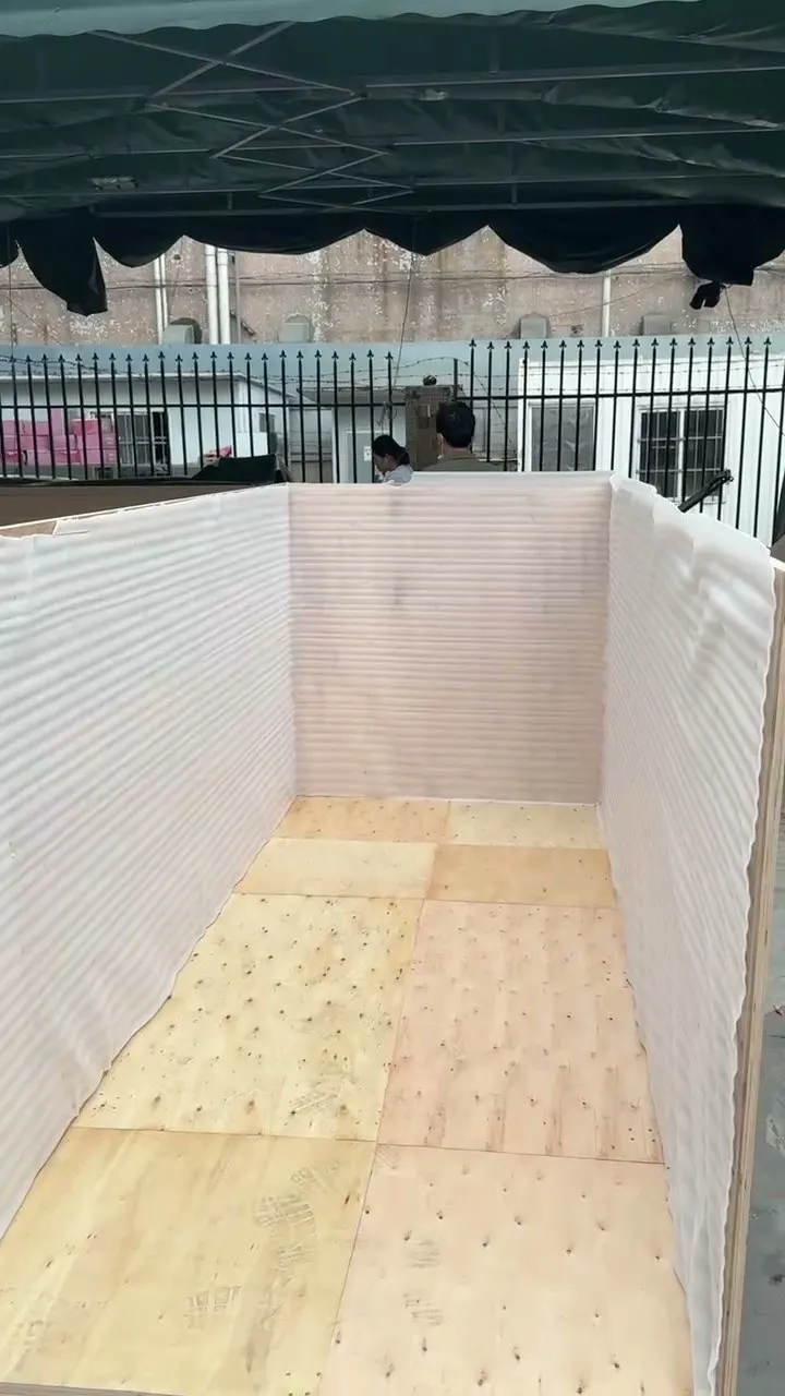 Foam-lined timber case prepared to protect glass and framed building materials.