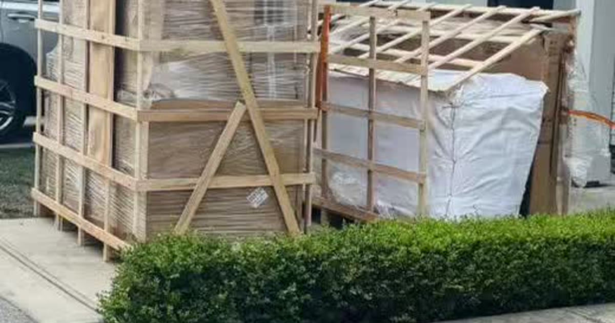 Export-crated household goods at the completed Canadian residential handover.