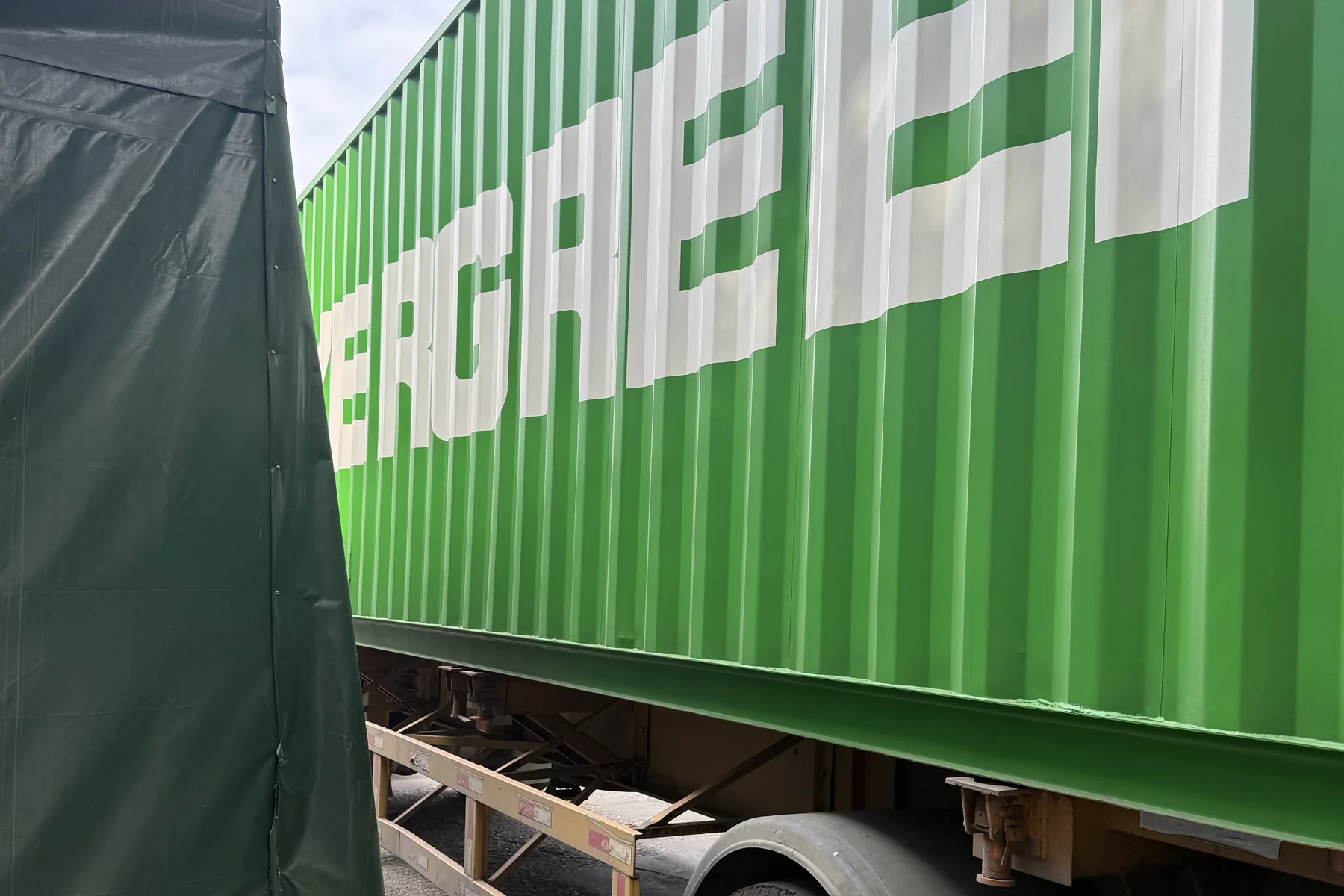An international shipping container at the dispatch stage of a real project